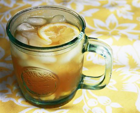 Cup of iced lemon and ginger tea